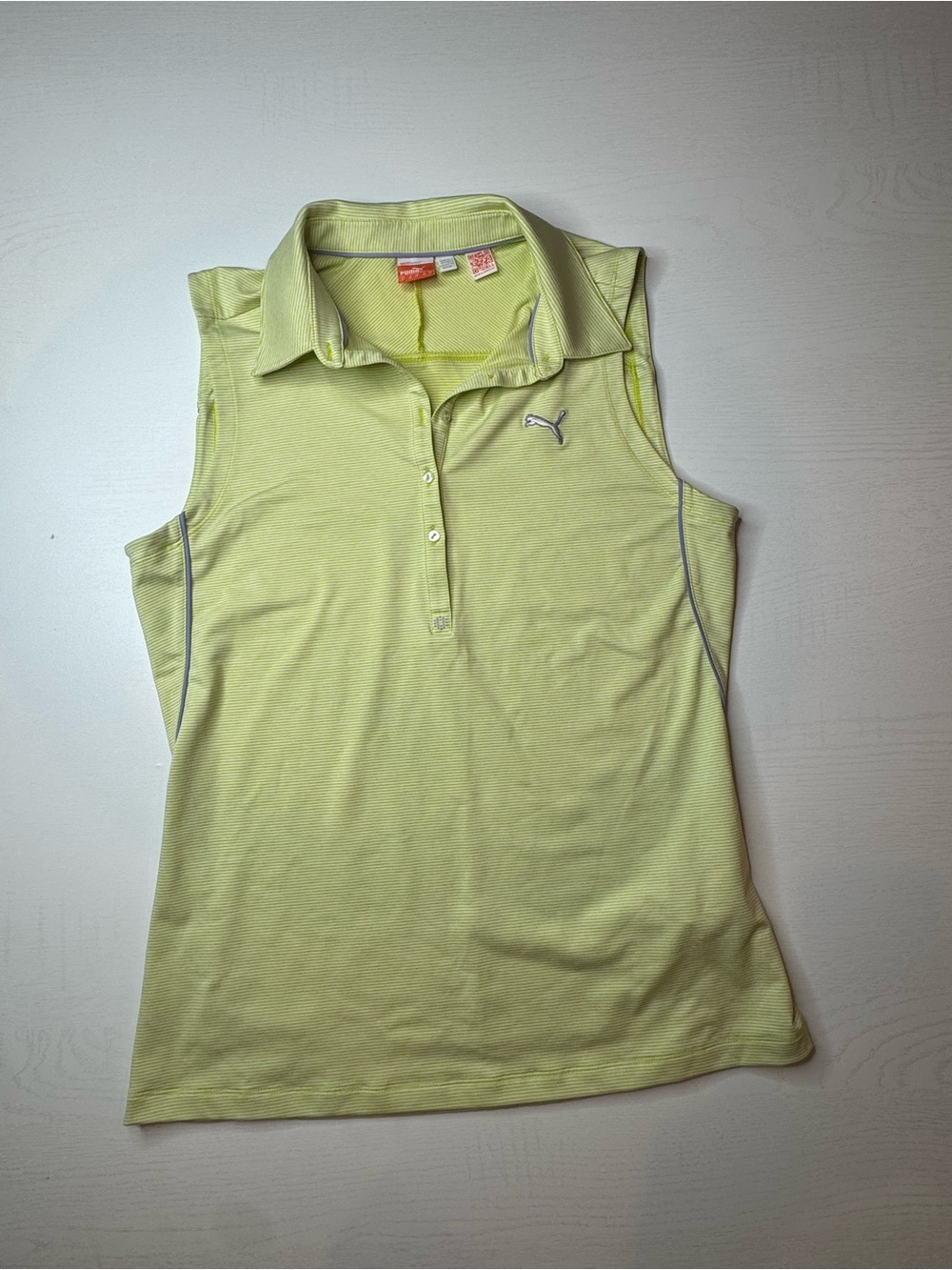 Puma Sleeveless Polo Top in Pale Lemon Lime